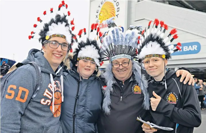  ?? ?? Exeter Chiefs fans pose, below, before the Aviva Premiershi­p semi-final between their team and Wasps at Sandy Park in 2016. They could be barred from taking their mascot, left, and other Native American parapherna­lia to matches