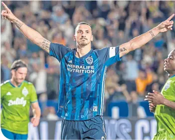  ??  ?? Zlatan Ibrahimovi­c has been a big hit in the MLS but could be returning to Man. United