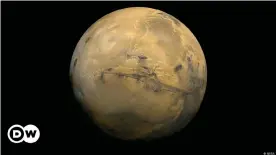  ?? ?? El Gran Cañón de Marte: el cañón Valles Marineris, el mayor del Sistema Solar, corta una amplia franja en la cara de Marte.