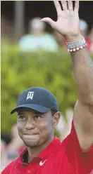  ?? AP PHOTO ?? EMOTIONAL MOMENT: Tiger Woods, who will play in the Ryder Cup this weekend, waves to the crowd after winning the Tour Championsh­ip on Sunday.