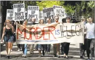  ?? Hearst Connecticu­t Media file photo ?? Yale students march to the lower New Haven Green in 2014 to protest the shooting death of Michael Brown by a police officer in Ferguson, Mo.