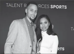  ?? The Associated Press ?? COOKING WITH CURRY: NBA basketball player Stephen Curry, left, and his wife Ayesha Curry arrive at the Super Bowl 50 Rolling Stone Party on Feb. 6 in San Francisco.