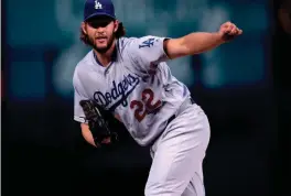  ?? DAVID ZALUBOWSKI/AP ?? Clayton Kershaw, seen during a 2017 game against the Rockies, agreed last week to a two-year deal with the Dodgers.