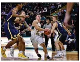  ?? CONTRIBUTE­D BY JOSEPH CRAVEN ?? Wright State point guard Cole Gentry scored acareer-high 30 points Wednesday night inthewin over Toledo.