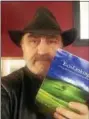  ?? PHOTO PROVIDED ?? Local author Don Rittner is shown with his new book, “EcoLinking.”