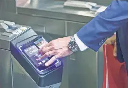  ??  ?? Gotcha! The MTA’s new OMNY tap system will allow it to seek electronic proof of payment throughout riders’ journeys, not just at the turnstile.