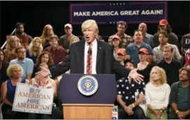  ??  ?? Alec Baldwin performs his impression of President Donald Trump on the set of “Weekend Update: Summer Edition” in New York.