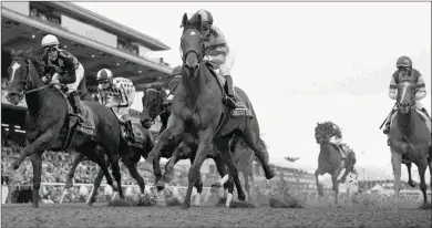  ?? BARBARA D. LIVINGSTON ?? Champagne Room (center), making just her third start of the year, set the pace in the Breeders’ Cup Distaff to the top of the stretch before fading to finish sixth.