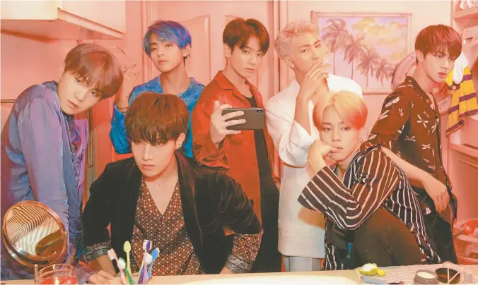  ??  ?? K-pop band BTS (above), and their latest album, Map of the Soul: Persona
(facing page).