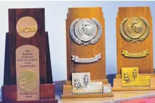  ??  ?? The skiers brought three trophies for high finishes at the NCAAs with them Thursday. The 2004 national title trophy wasn’t one of them.