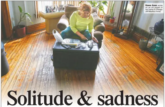  ?? (AP/Martha Irvine) ?? Dianne Green works on an art project in her home in Chicago.