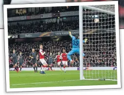  ??  ?? STUNNER: Ramsey watches his effort loop over Akinfeev