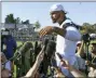  ?? MICHAEL OWEN BAKER — THE ASSOCIATED PRESS FILE ?? Cowboys quarterbac­k Dak Prescott talks to the media following practice at the team’s training camp in Oxnard.