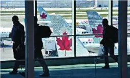  ?? MIKE CASSESE/REUTERS ?? Deaf-blind people are the only group Air Canada defines as exclusivel­y non-self-reliant, a distinctio­n that prohibits them from flying alone.