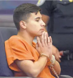  ?? GREG SORBER/JOURNAL ?? Izaiah Garcia awaits his detention hearing in 2nd Judicial District Court on Tuesday afternoon.