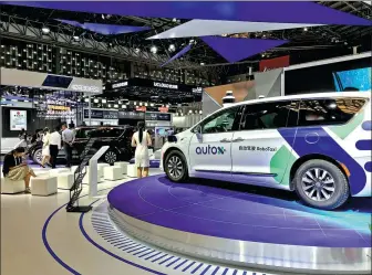  ?? LI FUSHENG / CHINA DAILY ?? AutoX showcases its autonomous vehicle at the World Artificial Intelligen­ce Conference, held from July 7-10 in Shanghai.
