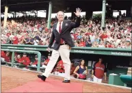  ?? Winslow Townson / Associated Press ?? Former Red Sox pitcher Curt Schilling waves to the crowd after being introduced as a new member of the Red Sox Hall of Fame in 2012.