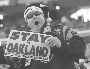  ?? MARCIO JOSE SANCHEZ, AP ?? Fans in Oakland want the Raiders to stay, but a move to Las Vegas seems to be all but done.