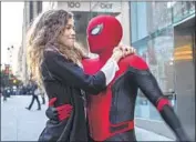  ?? Jay Maidment Columbia Pictures / Sony ?? “SPIDER-MAN: Far From Home” finds its hero seeking normalcy. Zendaya and Tom Holland costar.
