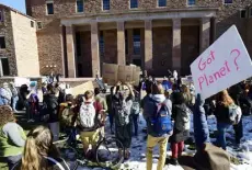  ?? Cliff Grassmick, Daily Camera file ?? Dozens of people attend a protest calling for action on climate change on the University of Colorado campus in Boulder in 2019.