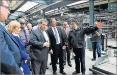  ?? Picture: EPA ?? SHOCKED: New York Governor Andrew Cuomo, fourth right, and New Jersey Governor Chris Christie, fifth right, tour the New Jersey transit train station where a train crashed