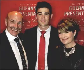  ??  ?? Barry O’Connor with his proud parents, George and Ellen, at a Sydney Swans club function prior to the coronaviru­s outbreak.
