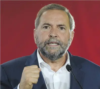  ?? SEAN KILPATRICK/ THE CANADIAN PRESS FILES ?? NDP Leader Tom Mulcair’s decision to oppose the Trans-Pacific Partnershi­p risks alienating many of the voters who had been willing, for the first time, to give the party a look, writes Andrew Coyne.