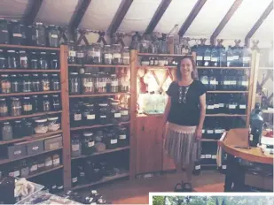  ??  ?? ABOVE AND RIGHT | Teresa Boardwine smiles alongside a shelf of herbs at Green Comfort, a school of herbal medicine situated right in her backyard.