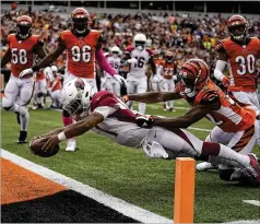  ?? BRYAN WOOLSTON / GETTY IMAGES ?? Cardinals rookie QB Kyler Murray, the No. 1 overall pick, earned his first win this past Sunday against the Bengals. Murray led the Cardinals to the winning field goal in the fourth quarter.