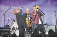  ?? Willy Sanjuan, Invision/ap file ?? Charismati­c bandleader Troy “Trombone Shorty” Andrews and his band Orleans Avenue (pictured here in May with Mavis Staples) will split the bill with soul rocker Ben Harper & The Innocent Criminals at the Mission Ballroom on Aug. 12.