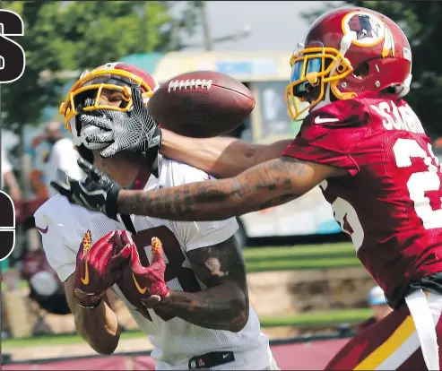  ?? — AP FILES ?? Wide receiver Josh Doctson (left) was injured at Redskins practice when Josh Norman landed on him.