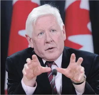  ?? SEAN KILPATRICK THE CANADIAN PRESS ?? Canadian special envoy Bob Rae releases a report on the humanitari­an and security crisis in Myanmar.