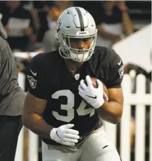  ?? Eric Risberg / Associated Press ?? Raiders running back Chris Warren III went undrafted after three seasons at Texas and averaging 5.6 yards on 204 carries.