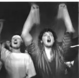  ?? John Moore/The Pittsburgh Press ?? Jodie Michalski, left and Cindy Cohill, both of Dormont, rocked out to Pink Floyd on May 31, 1988.