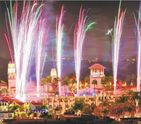  ?? Peter Cooper The Mission Inn Hotel & Spa ?? FIREWORKS USHER IN a past Festival of Lights at the Mission Inn Hotel &amp; Spa in Riverside. The celebratio­n runs through Jan. 6.