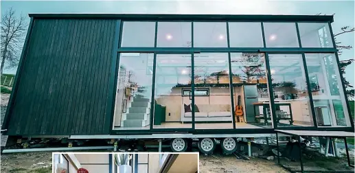  ?? ?? Nicole Marsh, right, and three of her children moved into their tiny home, above, in April. It is called Whare Mā rama: Mā rama means ‘‘clarity, light, inspiratio­n’’.