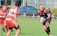  ?? DAVE LOUDON PHOTOGRAPH­Y ?? Southland Rams rugby league co-captain Shaun Tamariki-Todd carries the ball against the West Coast earlier this season.