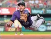  ?? JEFF CURRY, USA TODAY SPORTS ?? Rockies star Nolan Arenado, above, touted the acquisitio­n of reliever Pat Neshek.