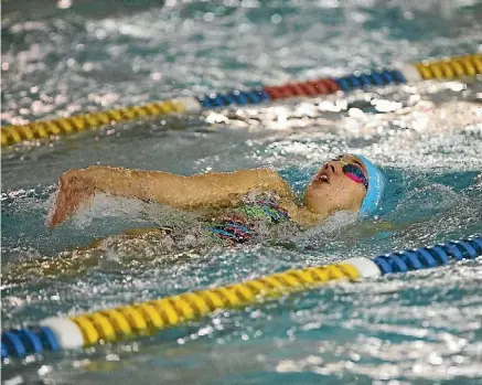  ?? PHOTO: DAVID UNWIN/FAIRFAX NZ ?? Manawatu’s Mya Rasmussen, here competing at the North Island secondary schools swimming championsh­ips earlier this month, is in the Swimming New Zealand national team.