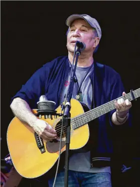  ?? Daniel DeSlover / TNS ?? After half a century, Paul Simon is on a farewell tour, though he says he’ll continue to write and record new material.