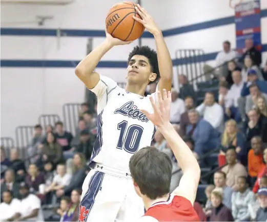  ?? ALLEN CUNNINGHAM/ FOR THE SUN- TIMES ?? St. Viator seniors Trey Calvin ( above) and Jerry Hernandez continued to impress at the Riverside- Brookfield Shootout.