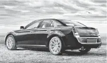  ?? CHRYSLER ?? The 2014 Chrysler 300 comes with rear-wheel drive or all-wheel drive and a new eight-speed transmissi­on.