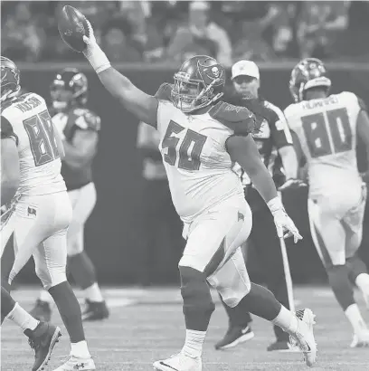  ?? CURTIS COMPTON/AP ?? Buccaneers defensive lineman Vita Vea celebrates his touchdown catch against the Falcons on Nov. 24, 2019, in Atlanta.