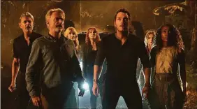  ?? John Wilson / Universal Pictures / TNS ?? From left, Jeff Goldblum, Sam Neill, Laura Dern, Bryce Dallas Howard, Chris Pratt, Isabella Sermon and DeWanda Wise in “Jurassic World Dominion.”