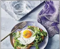  ?? Courtesy of Time Inc. Books/Caitlin Bensel ?? Waffles With Arugula, Fried Egg and Goat Cheese Butter