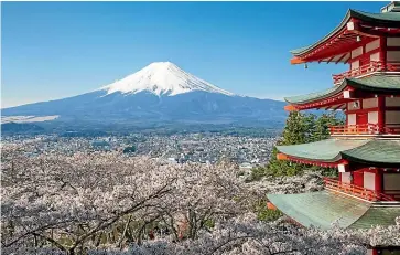  ??  ?? If you’re lucky, you’ll catch a glimpse of Mt Fuji on the shinkansen from Tokyo to Kyoto.