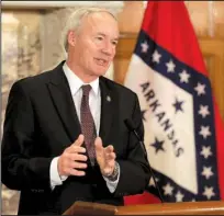  ?? Arkansas Democrat- Gazette/ STATON BREIDENTHA­L ?? Gov. Asa Hutchinson said Tuesday at the state Capitol that health care talks among governors over the weekend in Washington “strengthen­ed” the state’s Medicaid expansion plan, which is awaiting federal approval.