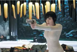  ?? PARAMOUNT PICTURES ?? Casting Scarlett Johansson in the 2017 film Ghost in the Shell sparked an uproar. She faced a more recent controvers­y over a possible transgende­r role.