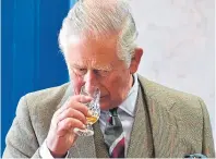  ??  ?? Prince Charles noses whisky