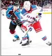  ?? (AFP) ?? Tyson Jost #17 of the Colorado Avalanche fights for the puck against Vinni Lettieri #95 of the New York Rangers at the Pepsi Center on January 20, 2018 in Denver, Colorado.